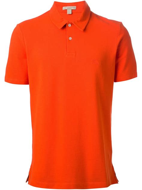 orange burberry polo